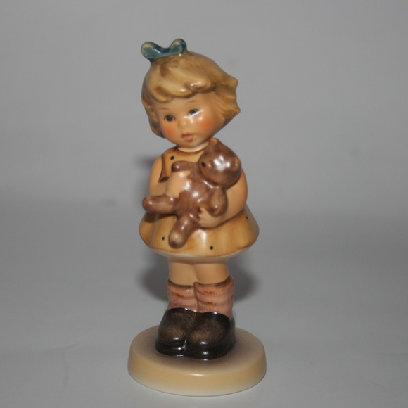 Goebel Hummel Girl w/ teddy bear Cuddles Figurine
